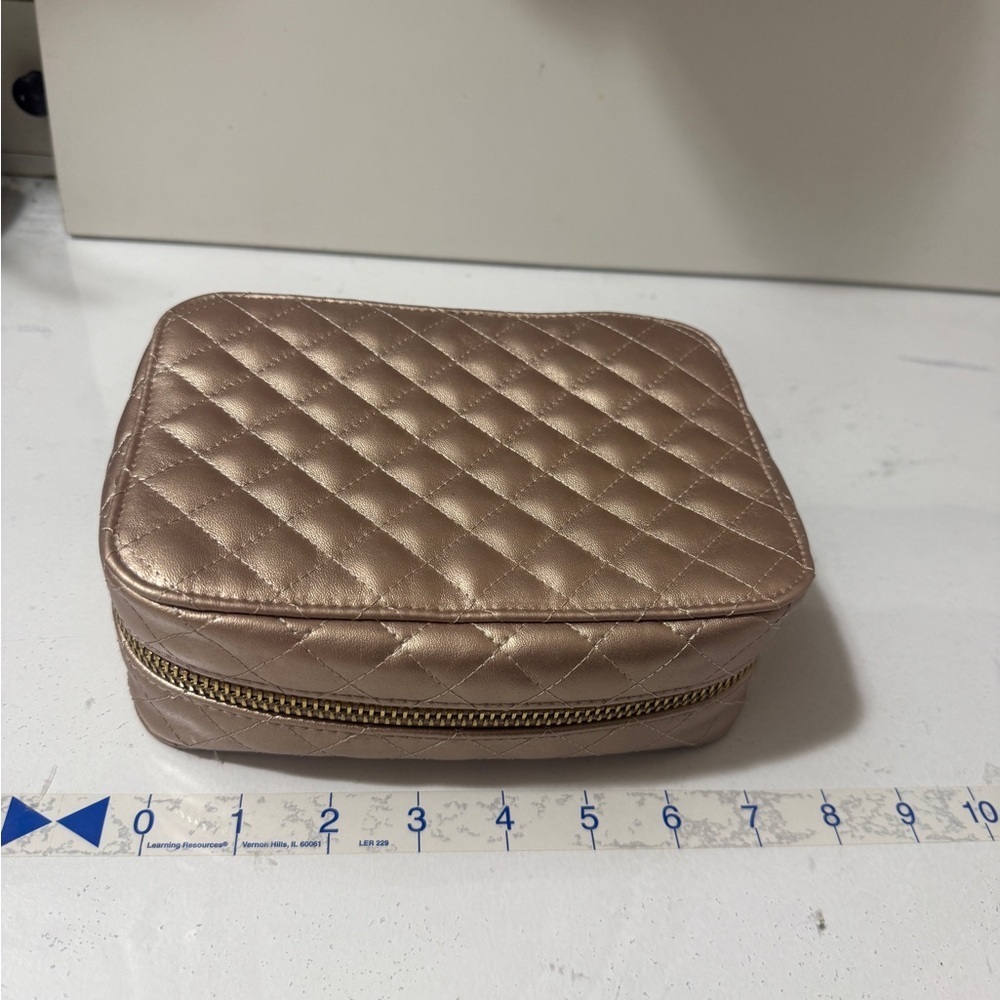 Trish McEvoy Makeup Planner.Quilted Metallic Rose Gold Travel Jewelry and makeup